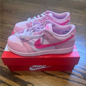 Nike Kids Dunk Low in Light and Bright Pink